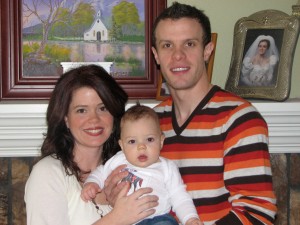 Our little family. My hair was bad that day. I look like I am in a beauty pagent.